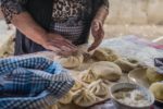 Experienced hands kneed the dough for Georgia's famous khinkali dumplings. Photo credit: Kees Sprengers