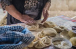 Making juicy Georgian meat dumplings, khinkali, at Iago's Winery in Mtskheta. Photo credit: Kees Sprengers