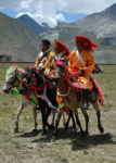 Feel the thrill of the race at a Tibetan Horse Festival. Photo credit: Phil Kidd