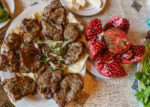 A typical Azerbaijani lunch of succulent grilled kebab on flatbread with pomegranates. Photo credit: Jered Gorman