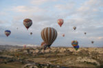 Hot-air ballooning offers a bird's-eye view of Cappadocia's stunning fairy chimneys, rock pillars, and tuff caves. Photo credit: Jered Gorman