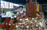 A vendor sells dried fruits and rope-like sweet Armenian churchkhela. Photo credit: Martin Klimenta