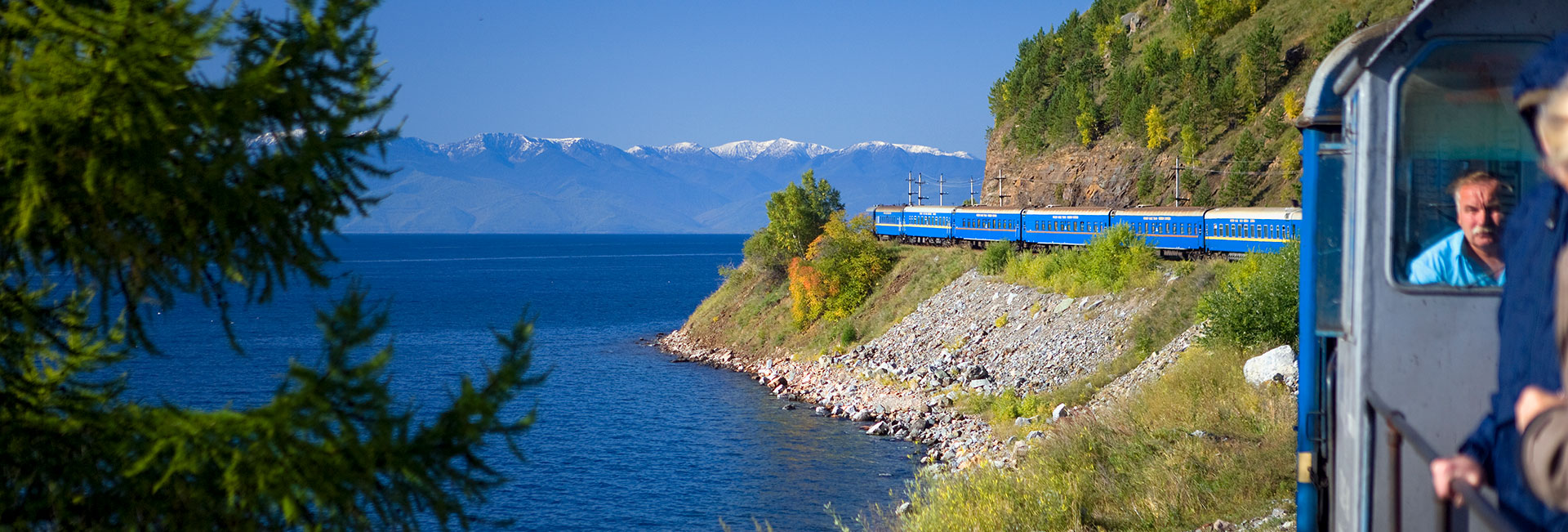 The Trans-Siberian Golden Eagle Express private train traveling around Lake Baikal, Russia