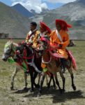 Colorful national dress in Tibet. Photo credit: Phil Kidd