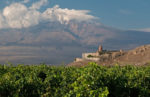 17th-century Khor Virap Monastery is framed by lush vineyards and towering Mount Ararat. Photo credit: Richard Fejfar