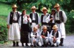 Locals in national clothing, Romania. Photo credit: Peter Guttman