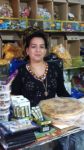 Bread, candy, and CDs for sale at the market (Ashgabat, Turkmenistan). Photo credit: Kevin Testa