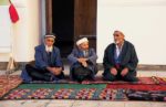 Local men in Bukhara, Uzbekistan. Photo credit:Michel Behar