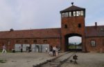 Auschwitz-Birkenau entrance gate in Poland. Photo credit: Martin Klimenta