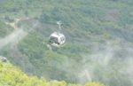 Riding a cable car up to Mt Dajti in Tirana. Photo credit: Peter Guttman