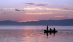 Sunset on Lake Issyk-Kul (Kyrgyzstan.) Photo credit: Vlad Ushak