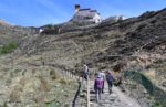 Climbing the stairs to a Tibetan monastery. Photo credit: Martin Klimenta