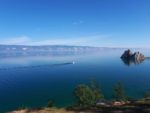 Shaman Rock and the clear blue waters of Lake Baikal in Siberia, Russia. Photo credit: Alla Shishkina