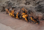 Continuously aflame and fed by underground deposits of natural gas, Yanar Dag has burned throughout antiquity (Azerbaijan.) Photo credit: Jake Smith