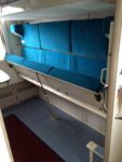 Sample Second Class Cabin, storage under lower bunk. Photo credit: John Seckel