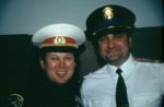 An early MIR exchange: Los Angeles police officers swap caps with their Soviet counterparts, after joining them on a Moscow beat. Photo credit: MIR Corporation