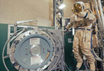 Simulate space tasks wearing an Orlan space suit, created for spacewalks. Photo credit: Christopher Prentiss Michel