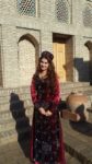 A woman in traditional dress spotted in Bukhara. Photo credit: Anya von Bremzen
