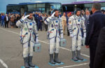 Cosmonauts salute space officials in their Ready to Go report, before heading to the launchpad. Photo credit: Don Cohen
