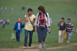 A MIR traveler chats with a newfound friend at Mongolia's Naadam festival. Photo credit: Helge Pedersen and Karen Ofsthus