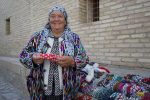 Woman selling woven slippers in Khiva, Uzbekistan. Photo credit: Jered Gorman