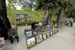 Original paintings and handicrafts at a park near Dry Bridge Market in Tbilisi, Georgia.