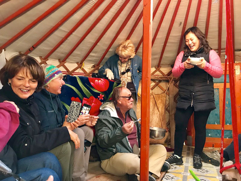 While in Ulgii, Mongolia, we visited a Kazakh nomadic family home where we were welcomed with plenty of traditional snacks and hot tea. Photo: Michel Behar