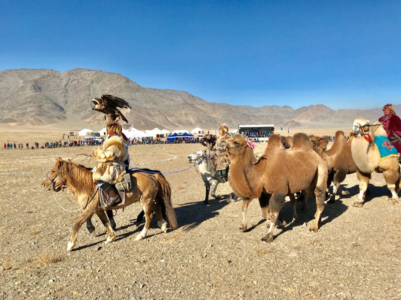 Another snapshot of a parade of eagle hunters, marking the start of Mongolia’s Golden Eagle Festival. Photo: Michel Behar