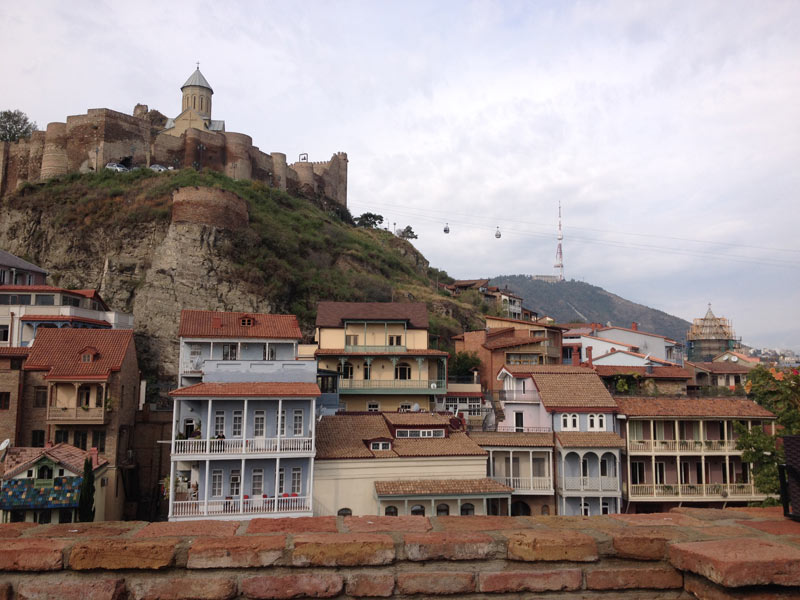 Riding cable cars from the Bridge of Peace to Narikala Fortress Tbilisi, Georgia