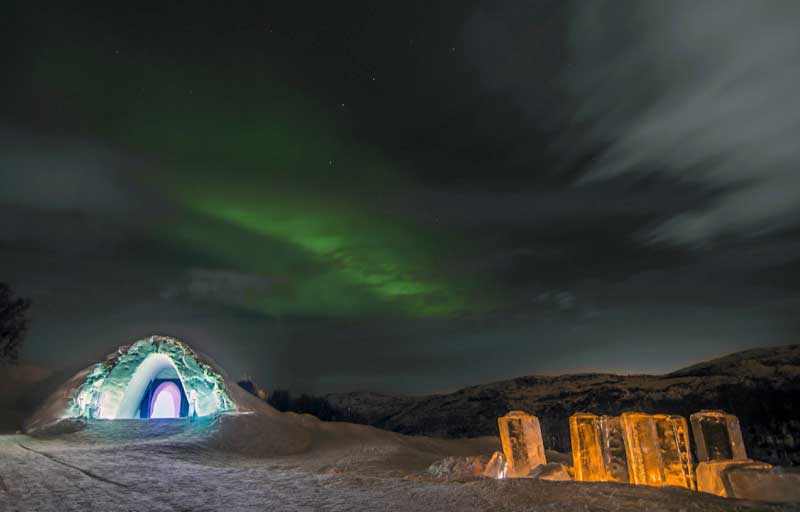 Northern Lights over the Snow Hotel. Photo credit: Kirkenes Snow Hotel / Nevra Pictures