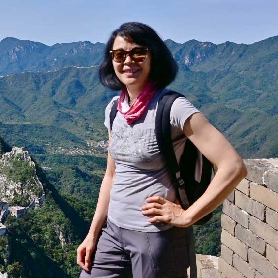 Lifeng Liu at the Great Wall, China. Photo credit: Lifeng Liu