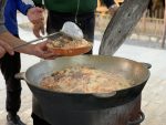 Serving fresh Turkmen plov in Ashgabat, Turkmenistan. Photo credit: Sapargylych Rahmanov