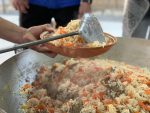 Serving Turkmen plov in Ashgabat, Turkmenistan. Photo credit: Sapargylych Rahmanov