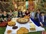 Local Tajiks gather around a traditional feast. Photo credit: Dilshod Karimov