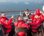 A toast to the Midnight Sun, illuminating the ocean surrounding Franz Josef Land. Photo credit: Jonathan Zaccaria