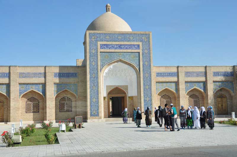 Locals gather outside the Bahauddin Naqshband Mausoleum near Bukhara. Photo credit: Russ & Ellen Cmolik