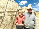 The group’s host poses with a MIR traveler. Photo credit: Michel Behar