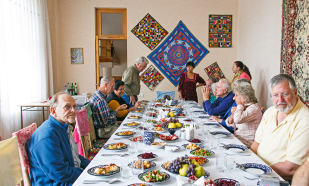 None of these good-mannered MIR travelers grabbed the “head of the table” spot in Samarkand, Uzbekistan. Photo credit: Lindsay Fincher