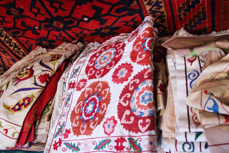 Hand-embroidered Central Asian suzani are a favorite buy in Uzbekistan's famed bazaars. Photo credit: Lindsay Fincher