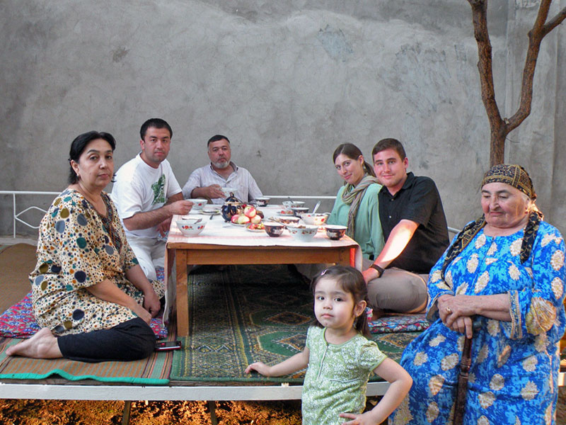 Here Jake and his wife dine with his host family in Tashkent, Uzbekistan; notice that neither one sat at the head of the table. Photo credit: Jake Smith