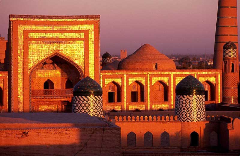 Khiva’s Ichon Qala (Old Town) at sunset, looking much as it did centuries ago. Photo credit: Peter Guttman