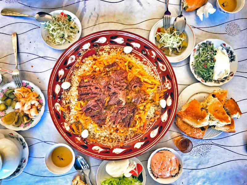 Samarkand-style plov is elegantly presented for a holiday celebration. Photo credit: Abdu Samadov