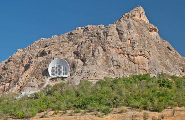 A museum is built into the side of UNESCO-listed Sulaiman-Too Sacred Mountain. Photo credit: Richard Fejfar