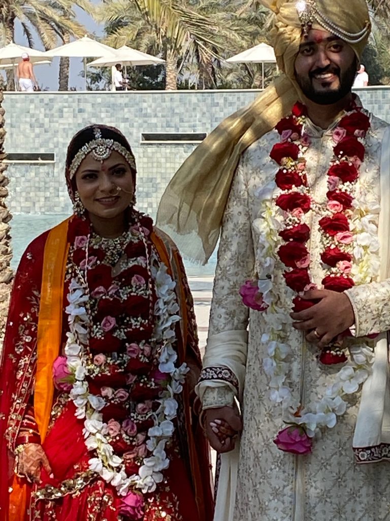 The happy couple of an Indian wedding at the Hilton Ras Al Khaimah Resort, UAE. Photo credit: Luba Rudenko