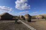 Enjoy a night at a cozy yurt camp in Mangystau, Kazakhstan. Photo credit: Andrei Astafyev