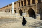Walking across the dry riverbed of the Si-o-se-pol bridge in Isfahan, Iran. Photo credit: Lindsay Fincher