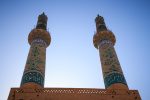 Towering minarets of the Jameh Mosque in Yazd, Iran. Photo credit: Lindsay Fincher