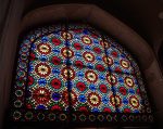 Stained glass leading to Dowlet Abad Garden, Yazd, Iran. Photo credit: Lindsay Fincher