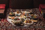 A table heavy with traditional Saudi dishes. Photo credit: Saudi Tourism Authority