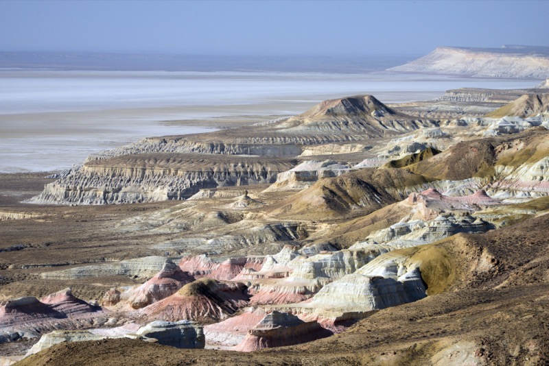 Salt flats, chalky hills, and limestone cliffs of Sor Tuzbair in Mangystau, Kazakhstan. Photo credit: Andrei Astafyev